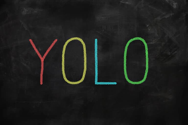 the word "YOLO" on a black background